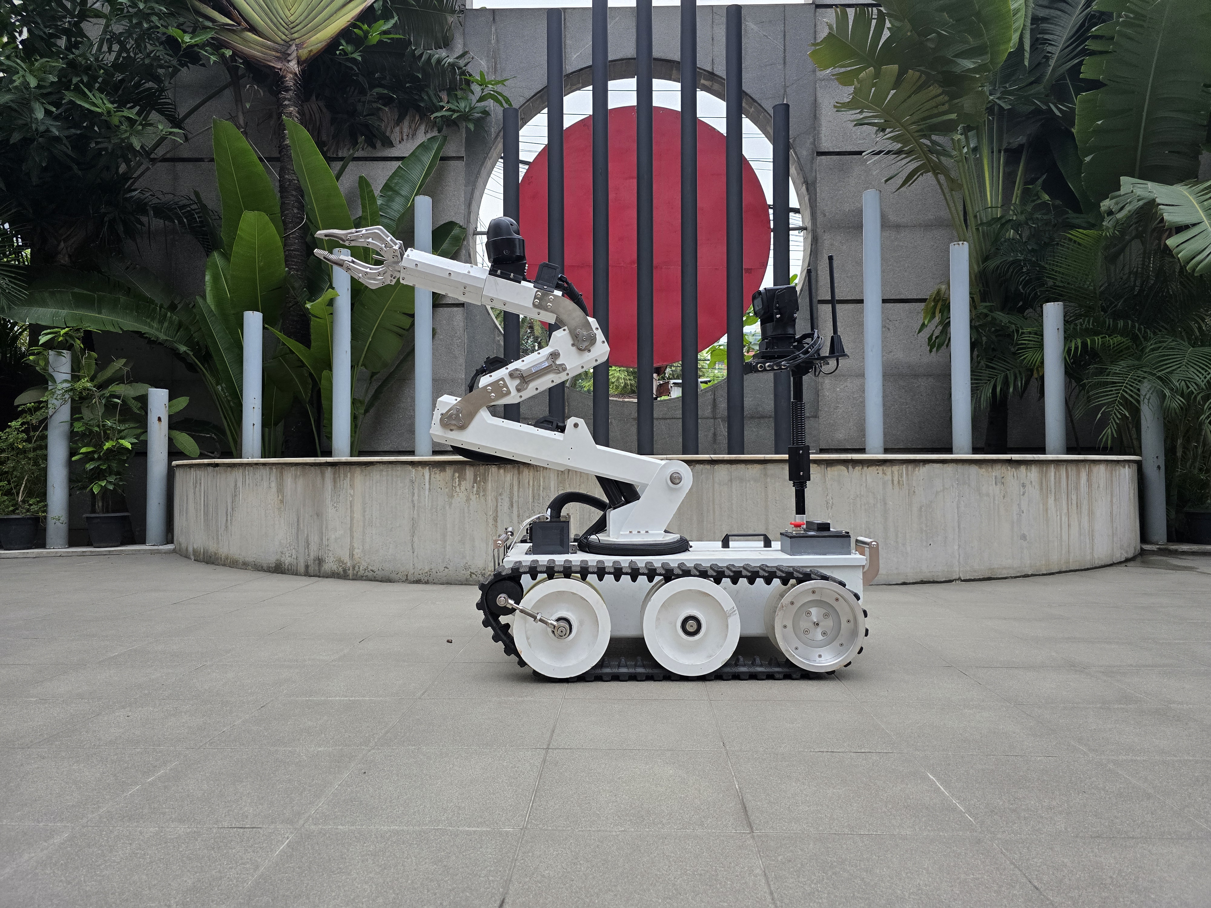 Jontro Soinik 1.0 in front of Bangladesh national emblem